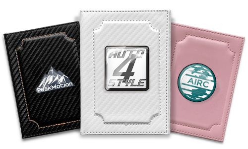 Three card holders with distinct logos: black with mountain icon, white with metallic AUTO 4 STYLE emblem, pink with wave symbol