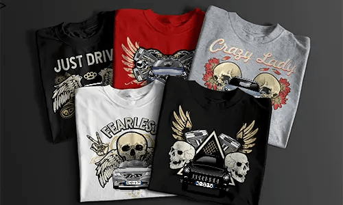 Two T-shirts with detailed car front graphics, one red with bold black design and one white with lighter print, placed side by side next to a black gift box with ribbon, automotive-themed apparel for car enthusiasts