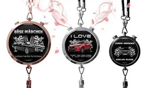 Three round pendants with car themes on black backgrounds. Left: vintage car with German text and checkered flags. Center: red SUV, 
