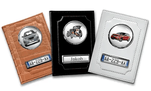 Three personalized car document holders with custom designs