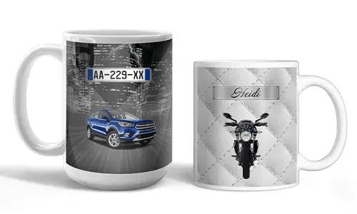 Two white mugs with vehicle-themed prints: blue SUV with city lights, motorcycle with quilted silver background and name Heidi