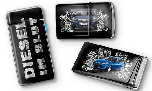 Three black car-themed lighters with metallic accents. One has 