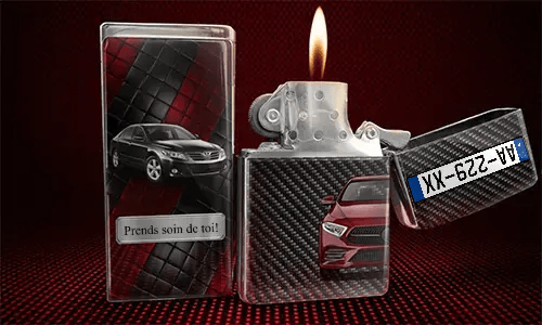 Flip-top lighter with flame: red car on carbon fiber background, black car with name JONAS on quilted panel