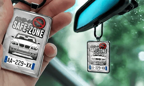 Auto-Safezone-Anhänger mit Weiß Leder Hintergrund nd Lederkette im Wagen Safezone-Anhänger