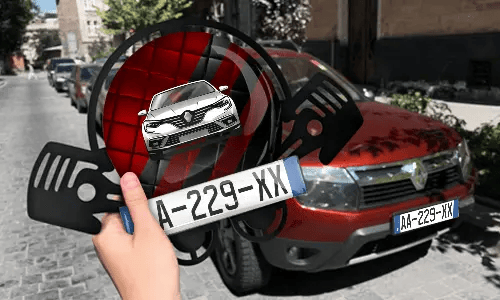 Autoschlüsselanhänger in der Hand mit dem Kennzeichen auto schlüsselanhänger gravur