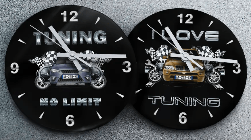 Two racing-themed wall clocks: left with black car and TUNING NO LIMIT text, right with blue car and MOVE TUNING text