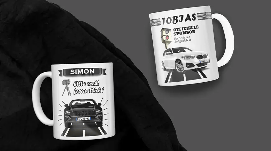 Two white mugs with car and speed camera prints: Simon's mug with friendly message, Tobias's mug with humorous fine office text